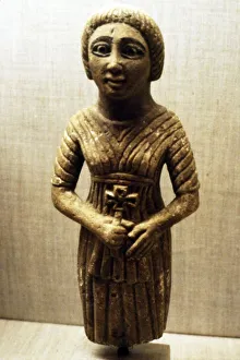 Coptic figure of woman clasping a crucifix, Sheik Ibada, Upper Egypt, 350-400 Coptic figure of woman clasping a crucifix, Sheik Ibada, Upper Egypt, 350-400