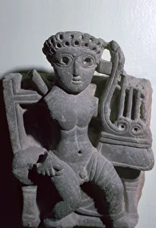 Coptic statuette of Orpheus with a lyre, 3rd century