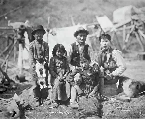 Puppies Prints: Cordova natives and dogs, between c1906 and 1915. Creator: Eric A. Hegg