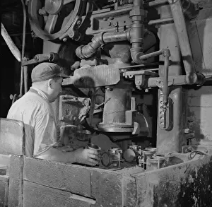 A core blowing machine, New Britain, Connecticut, 1943. Creator: Gordon Parks