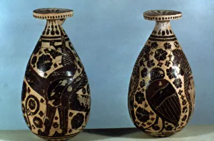 Corinthian vases decorated with black figures of animals, fantastic creatures and floral motifs Corinthian vases decorated with black figures of animals, fantastic creatures and floral motifs