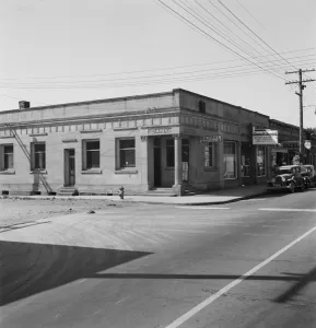 Main Street Gallery: Corner of main street, Tenino, Thurston County, Western Washington, . Creator: Dorothea Lange