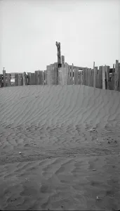 Corral Prints: A corral practically buried by drifted dust