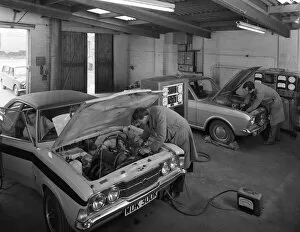 Car Maintenance Gallery: Cortina Mk 2 and Mk3 GT in a garage being serviced / modified, 1972