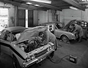 Car Maintenance Gallery: Cortina Mk 2 and Mk3 GT in a garage being serviced / modified, 1972