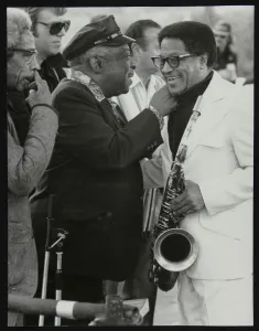 Count Basie chatting with Illinois Jacquet at the Capital Radio Jazz Festival, London, July 1979