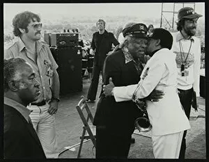 Hugging Gallery: Count Basie and Illinois Jacquet meet up on stage at the Capital Radio Jazz Festival, London, 1979