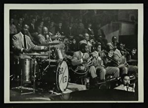 Guitarist Gallery: The Count Basie Orchestra in concert, c1950s. Artist: Denis Williams