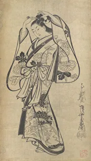 Courtesan Placing a Hairpin in Her Hair, ca. 1714. ca. 1714. Creator: Kaigetsudo Anchi