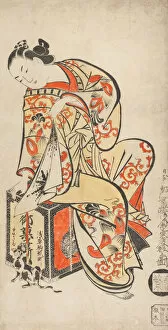 Hand Coloured Woodblock Print Gallery: Courtesan Playing with a Cat, c. 1715. Creator: Dohan Kaigetsudo