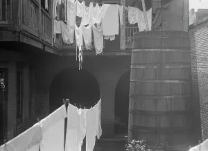 Clothes Line Prints: Courtyard with cistern and hanging laundry