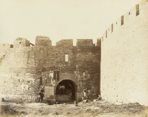 Battlements Prints: Courtyard with Fortified Walls and Figures, 1860. Creator: Felice Beato