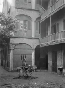 Banana Prints: Courtyard, New Orleans, between 1920 and 1926. Creator: Arnold Genthe