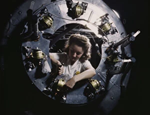 Women At Work Collection: Part of the cowling for one of the motors for a B-25...North American Aviation, Inglewood, CA
