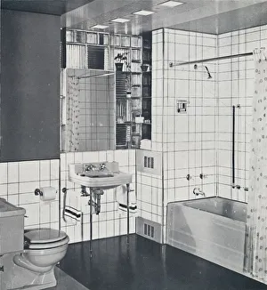 Shower Collection: Crane Co. - A compact recess tiled in canary yellow, scored with orange, showing