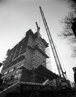 Office Building Collection: Crane lifting staircase carriageways into a new office building, Sheffield, South Yorkshire, 1961