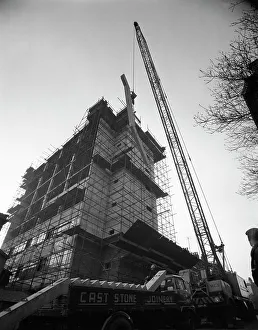 Work In Progress Prints: Crane lifting staircase carriageways into a new office building