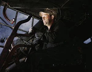 Crane operator at TVA's Douglas Dam, Tennessee, 1942. Creator: Alfred T Palmer