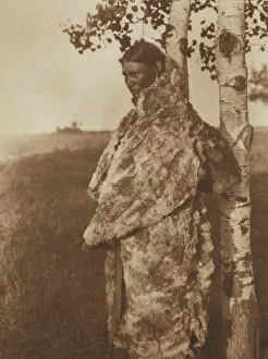 North American Prints: Cree Woman with Fur Robe, 1926. Creator: Edward Sheriff Curtis