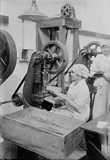Crate Prints: Crimping ignition tubes, between c1915 and c1920. Creator: Bain News Service