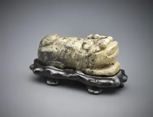 Jewelry And Ornament Prints: Crouching tiger, Period of Division, 220-266. Creator: Unknown