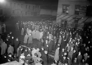 Shipwrecked Prints: Crowd awaiting Titanic survivors, 1912. Creator: Bain News Service