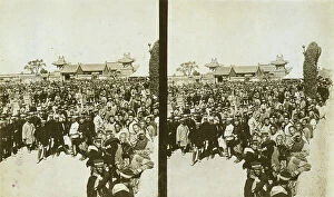Disputed Territory Collection: A crowd of Japanese soldiers; Chinese coolies in right foreground, Manchuria, c1905