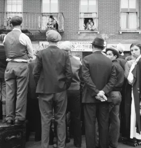 Lower East Side Prints: Crowds around post office, Lower East Side, New York, 1936. Creator: Dorothea Lange