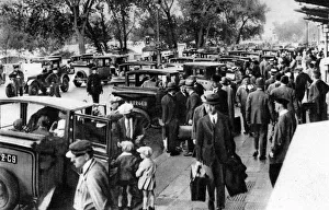 Ernest Flammarion Prints: Crowds in front of the station, Orsay, Paris, 1931. Artist: Ernest Flammarion