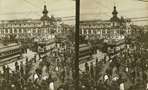 Crowded Collection: Crowds on a Tokyo street, near the train station(?), during the celebration of Admiral..., c1905
