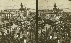 Crowds on a Tokyo street, near the train station(?), during the celebration of Admiral... c1905. Creator: Underwood & Underwood. Crowds on a Tokyo street, near the train station(?), during the celebration of Admiral... c1905