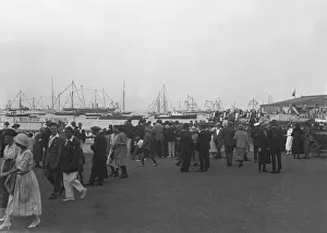 Crowds on the water front during a regatta, c1930. Creator: Kirk & Sons of Cowes