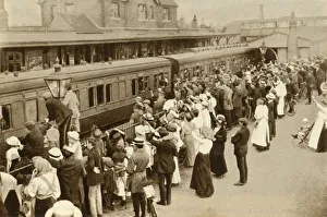 Relative Prints: Crowds waving off troops leaving to fight in the First World, War, Britain, 1914, (1935)
