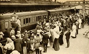 Crowds waving off troops leaving to fight in the First World, War, Britain, 1914, (1933)