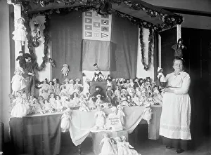 Stall Prints: Crown Mother with Exhibit of Dolls, 1915