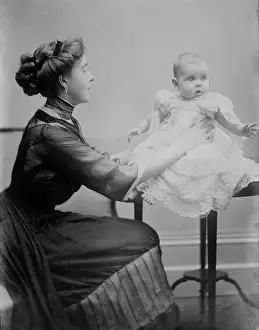 Press Photographer Prints: Crown Princess of Sweden holding her child, 1910. Creator: Bain News Service