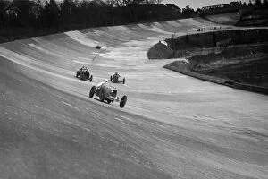 Barc Gallery: CS Stanilands Bugatti Type 37A leading a Benz and Jack Dunfees Ballot, Brooklands, 1930