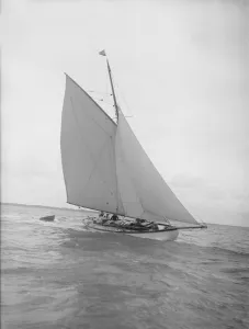 Breeze Prints: The cutter Nanette sailing close-hauled, 1911. Creator: Kirk & Sons of Cowes
