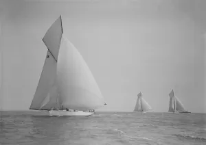 The cutter Onda sailing under spinnaker, 1911. Creator: Kirk & Sons of Cowes
