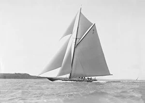 Race Collection: The cutter Shamrock sailing close-hauled, 1912. Creator: Kirk & Sons of Cowes
