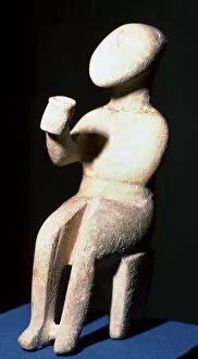 Cyclades Gallery: Cycladic marble seated figure holding a cup