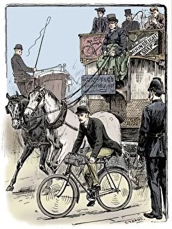 Best of British Collection: Cyclist in busy London traffic riding a machine of the Rover safety type, 1895