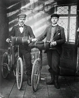 Photographic Studio Prints: Cyclists in the studio; two men with bicycles, 1890-1910. Creator: Lars Olsson Akerman