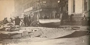 His Majesty The King Prints: Damage caused on the Victoria Embankment when the Thames burst its banks and caused a number of fat