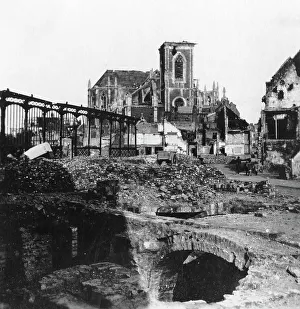 Damaged exterior of the Church of St Vst, Armentieres, France, World War I, c1914-c1918 Artist: Nightingale & Co