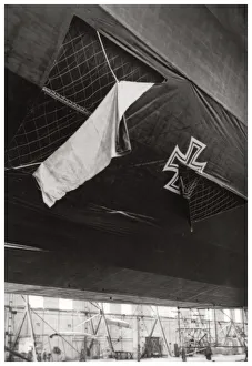 Iron Cross Prints: Damaged German navy Zeppelin airship, World War I, 1914-1918 (1933)