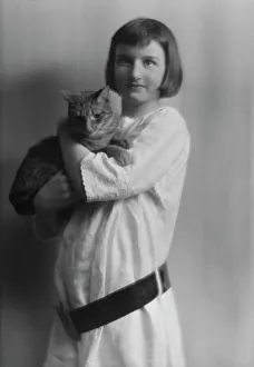 Damrosch, Anita, Miss, with Buzzer the cat, portrait photograph, 1914 Mar. 27. Creator: Arnold Genthe