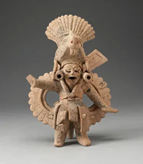 Mesoamerican Collection: Dancing Figure Wearing Animal Headdress and Ornate Costume, A.D. 600 / 900