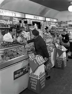 Danish Bacon May Fare shop display, Wath upon Dearne, South Yorkshire, 1964. Artist