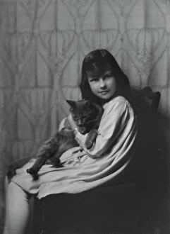 Feline Collection: Daughter of Mrs. H Gamble, with cat, portrait photograph, 1917 Nov. 23. Creator: Arnold Genthe